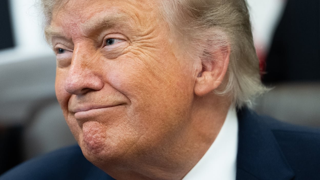 Donald Trump smirking.
