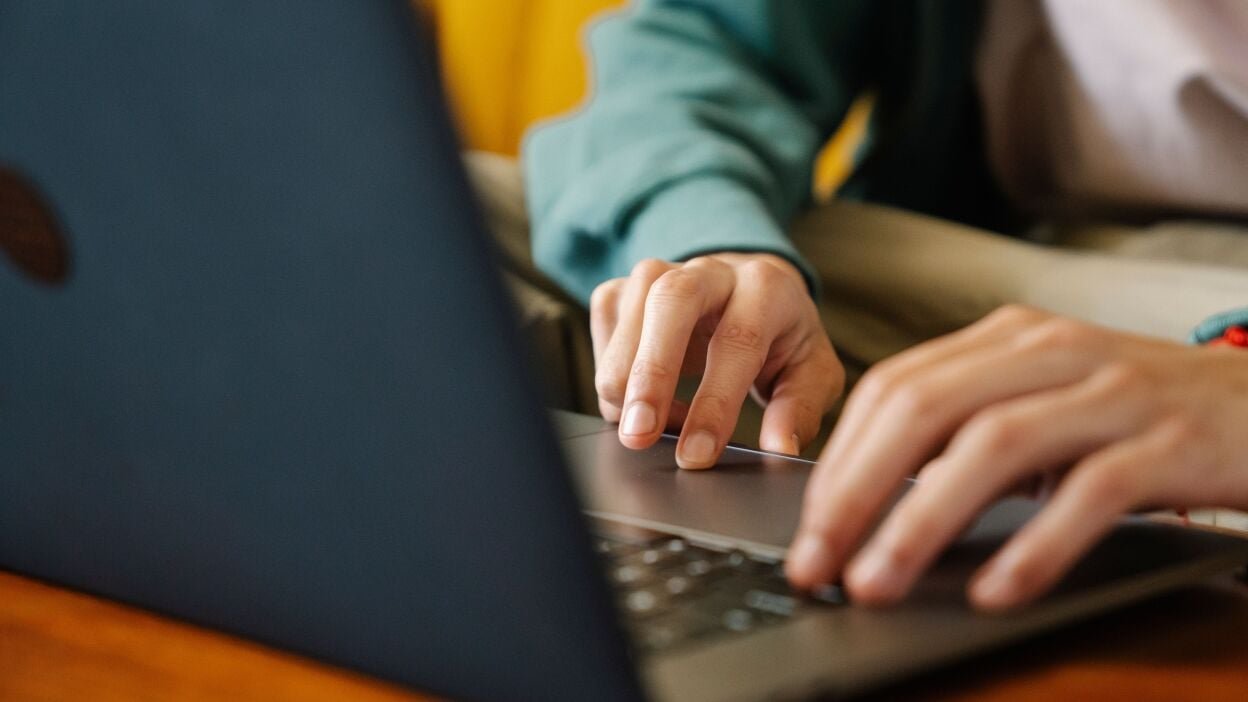 Hands on laptop