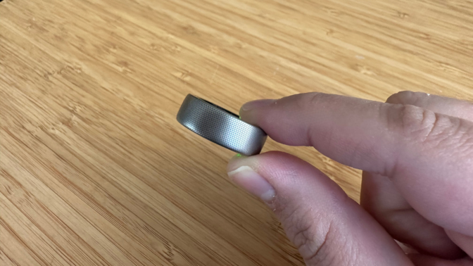 A person holding the Amazfit Helio Ring